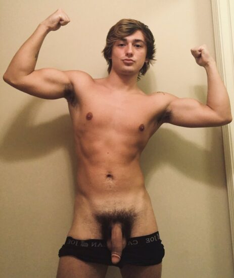 Flexing boy with a big cock