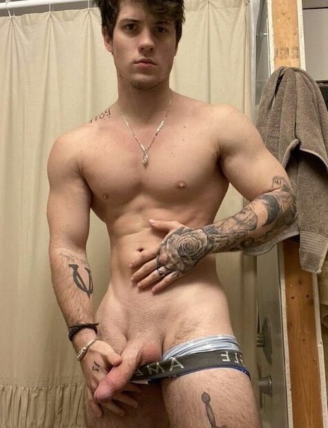 Muscle boy with shaved cock